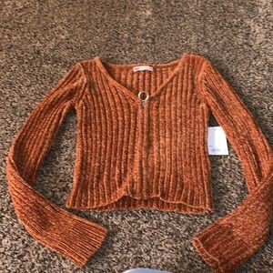 Size XS burnt orange zip up sweater